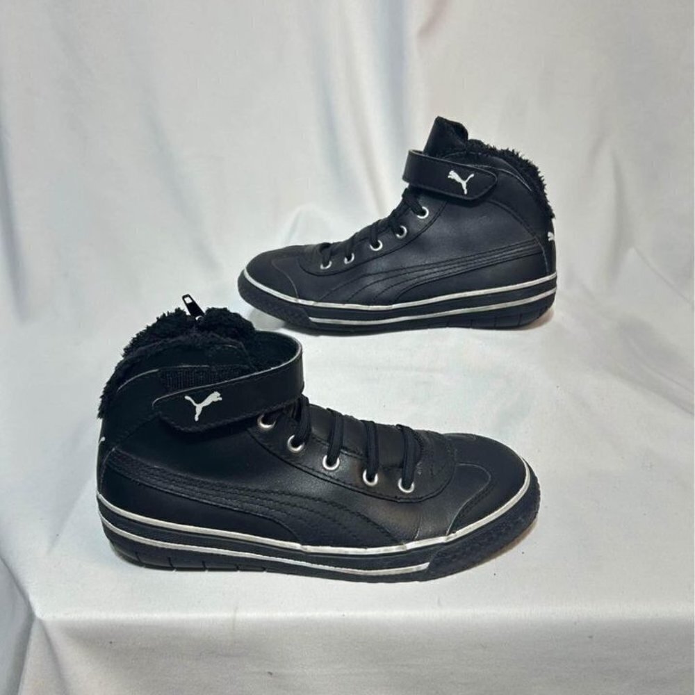 PUMA leather lined high tops. Black. Size 2. Side zipper. Excellent condition. N